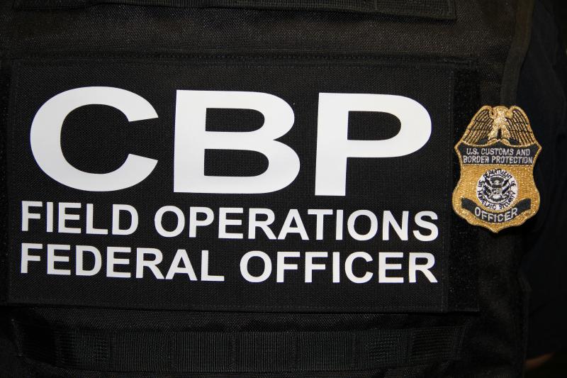 CBP officers discover hard narcotics stashed in two pickups.