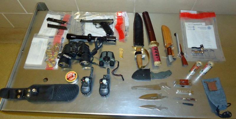 Officers performing outgoing operations arrested a Mexican male who was carrying weapons. He had in his possession a handgun, ammunition, and several knives