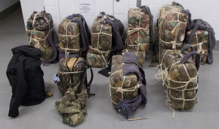 Agents from Camp Grip intercepted five backpackers who were caught with more than 400 pounds of marijuana