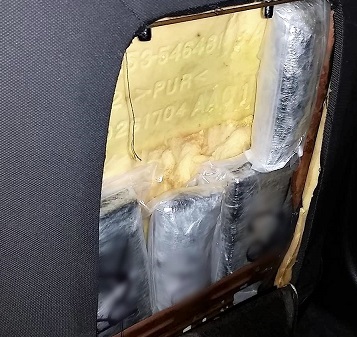 A combination of hard drugs were removed from the doors and seats of a smuggling vehicle