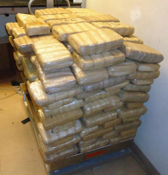 Officers discovered nearly 220 pounds of marjuana within a smuggling vehicle