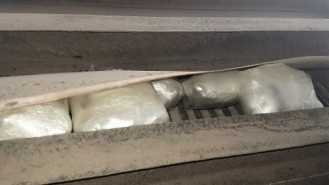 Packages of meth were hidden beneath the floors of a trailer