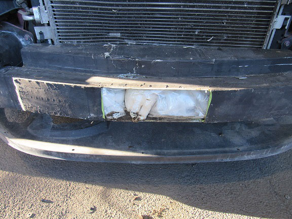 Upwards of $240,000 worth of cocaine and meth were removed from a smuggling vehicle
