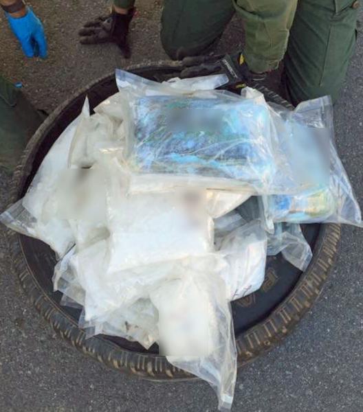 Agents removed nearly 60 pounds of meth and cocaine from a spare tire 