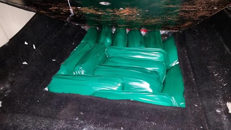 Officers seized a large volume of heroin, fentanyl, cocaine and meth from the floor of a smuggling vehicle