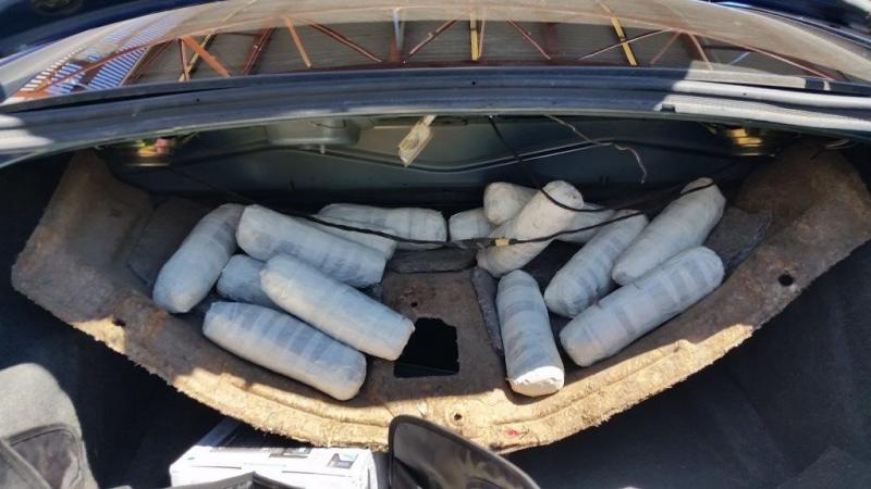 Officers were led to the inside of a smuggling vehicle, where they found a combination of meth and cocaine