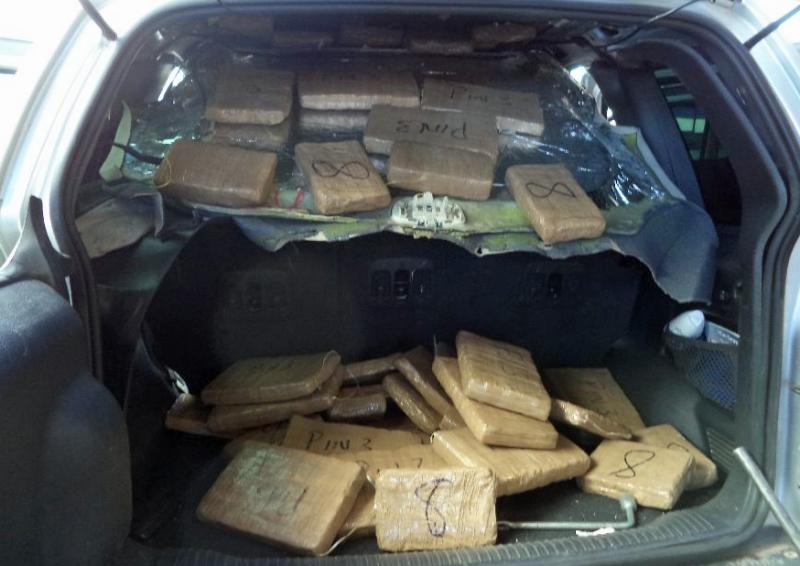 More than 40 packages of marijuana were discovered within the headliner of a smuggling vehicle