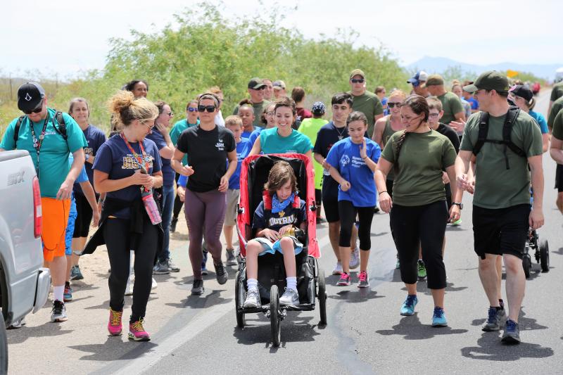 Members of various BP stations gathered to run a section of the Torch Run through the town of Vail, Arizona
