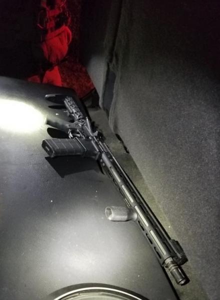 Agents seized a tactical rifle from a pair of suspected alien smugglers