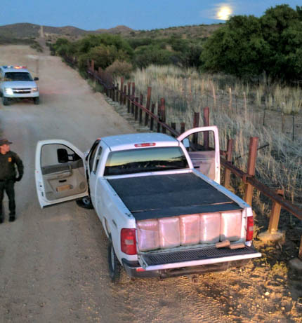 Agents in Douglas, Ariz. seized more than 1,800 pounds of marijuana after stopping a truck that had crossed illegally, east of town