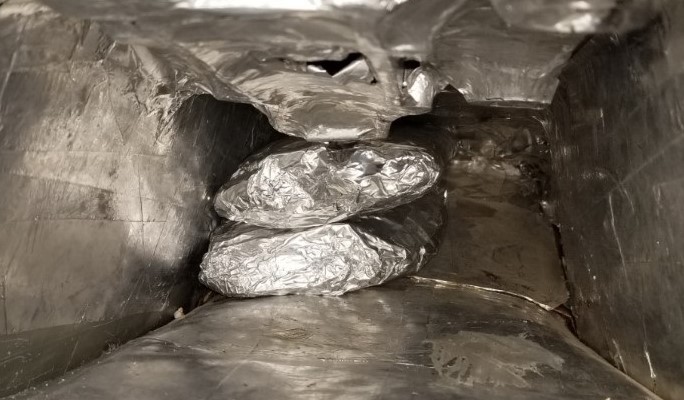 Agents discovered 25 pounds of meth inside of a smuggling vehicle