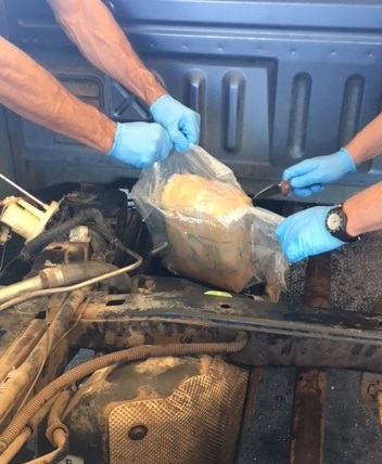 Agents removed packages of marijuana from a vehicle stopped at the Interstate 19 immigration checkpoint