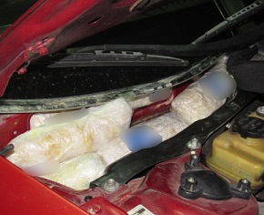 Officers removed packages of meth from the cowling of a smuggling vehicle