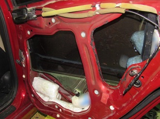 The door frame of a smuggling vehicle was found to contain packages of meth