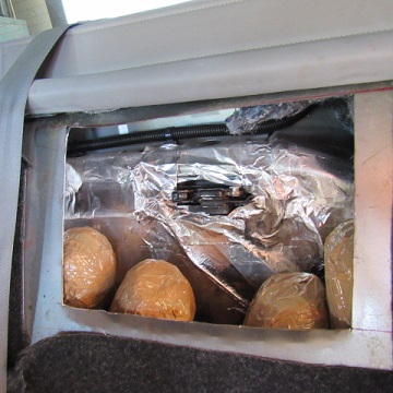 Officers removed 30 packages of meth from behind the back seats of a smuggling vehicle