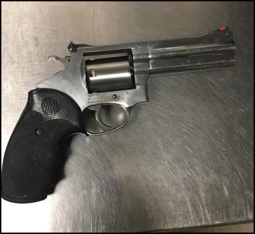 Agents seized a .357 caliber revolver as well as drugs from a smuggling vehicle on Friday