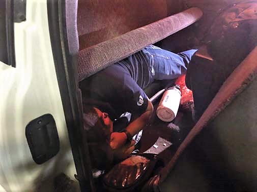 Agents searching a vehicle at the I-19 checkpoint found a person hiding under the bench seat