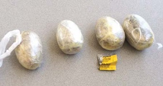 Agents at the I-19 checkpoint seized brown tar heroin from a woman travelling within a passenger shuttle