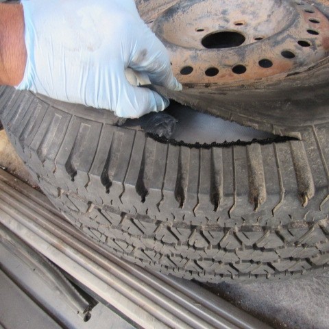 A narcotics detection canine alerted officers to the spare tire of a smuggling vehicle, where they found nearly 45 pounds of meth