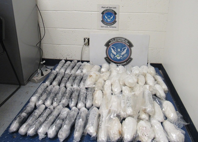 CBP officers seized nearly 12 pounds of heroin valued at $133,000 and 65 pound of methamphetamine valued at more than $59,000 in Arizona.