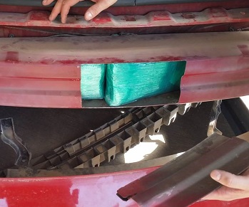 Officers located cocaine within the bumpers of a smuggling vehicle