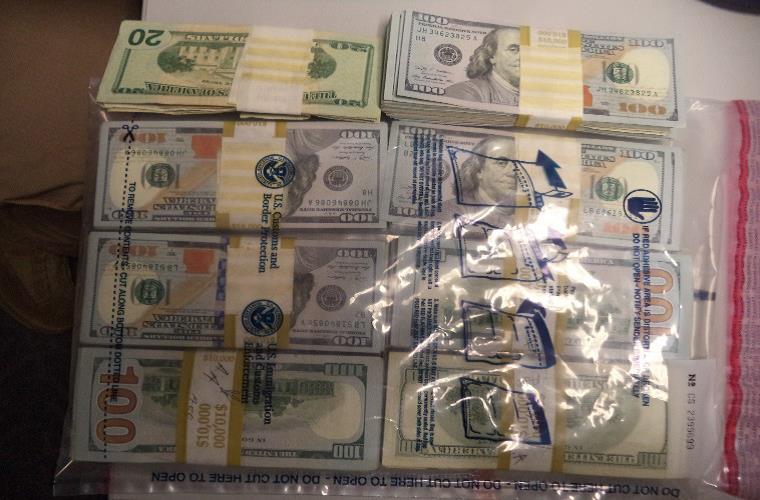 Officers seized $70,000 in unreported currency as well as $50,000 in unendorsed cashier's checks
