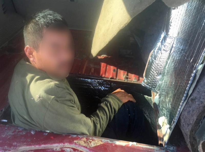 A Mexican national was discovered within a hidden compartment inside of a smuggling vehicle
