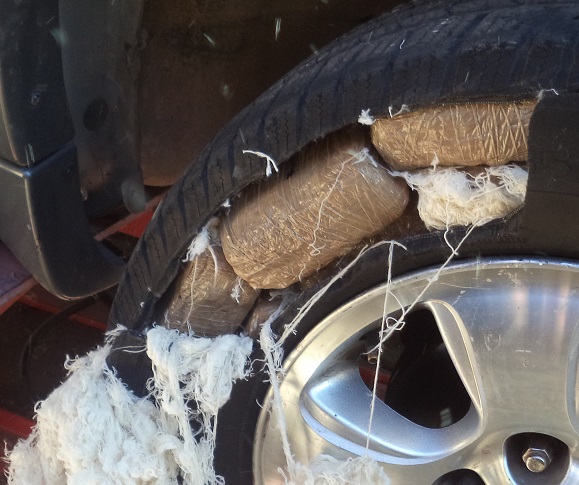Officers discovered packages of marijuana within the tires of smuggling vehicle