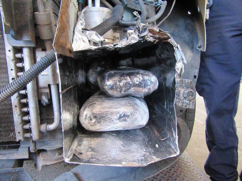 Officers seized over 26 pounds of heroin from within the front bumper of a smuggling vehicle