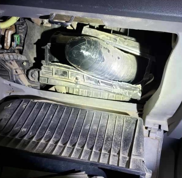 Agents discovered 26 pounds of meth inside of the dashboard of a smuggling vehicle