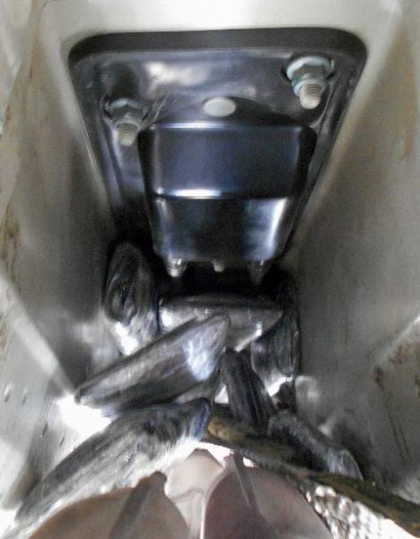 A CBP narcotics detection canine alerted to the undercarriage of a smuggling vehicle, where officers located and removed nearly 25 pounds of meth from beneath the exhaust system