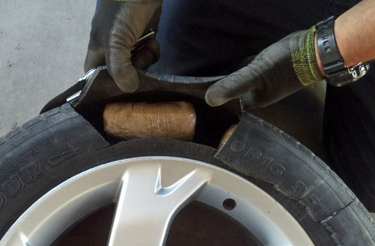 Officers removed packages of marijuana from the tires of a smuggling vehicle, as well as the engine compartment, front bumper, rear passenger door and within the dashboard