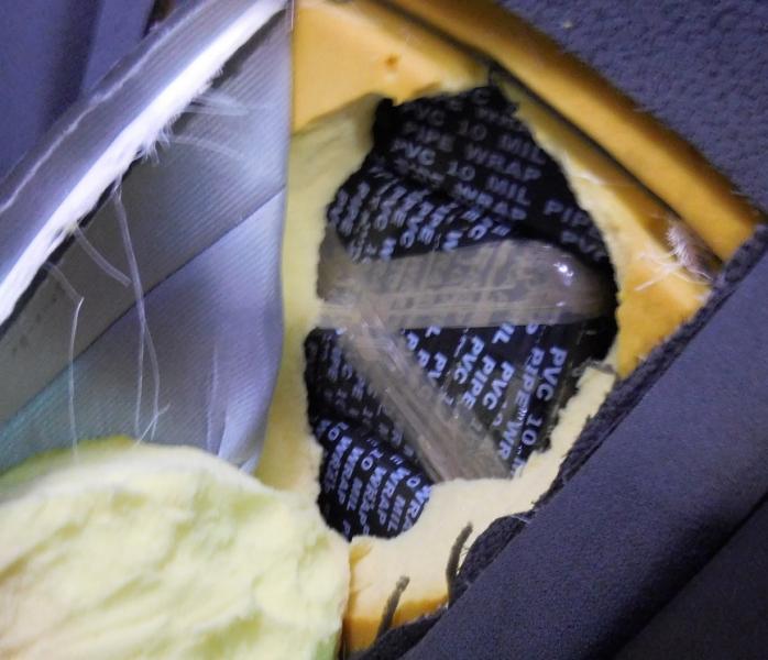 Smugglers tried to hide cocaine inside of the rear seats of a vehicle