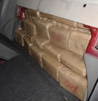 A CBP canine led officers to more than 250 packages of marijuana hidden throughout a smuggling vehicle 