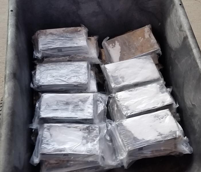 CBP officers discovered 64 pounds of cocaine within the back seat of a smuggling vehicle