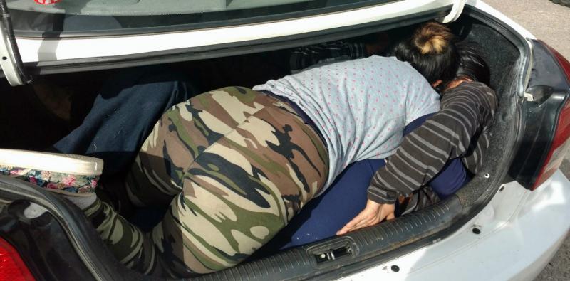 Mexican nationals stuffed in the trunck of a compact car