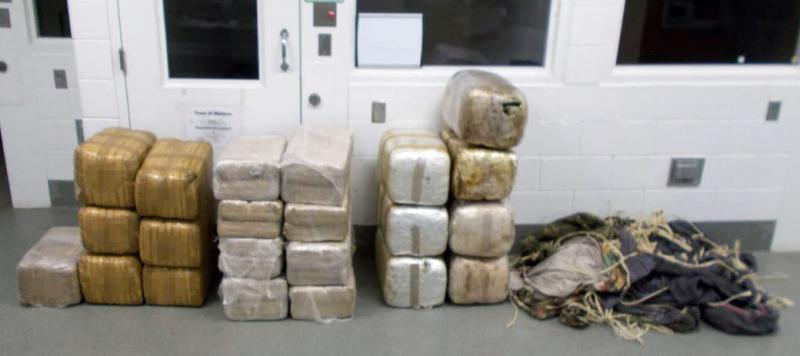 500 pounds of marijuana seized from six persons who had backpacked the drugs into the U.S.