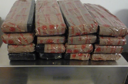 Officers seized a total of 13.21 pounds of alleged Mexican brown heroin.