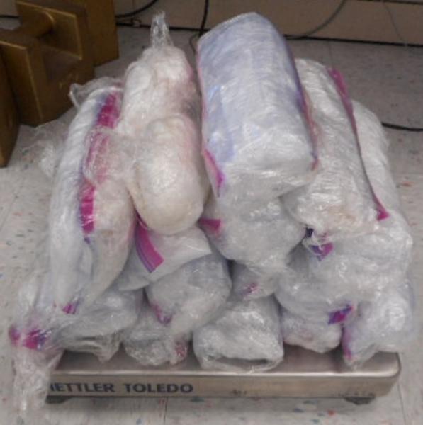 CBP officers retrieved 19 packages of methamphetamine from the floor area of the vehicle.