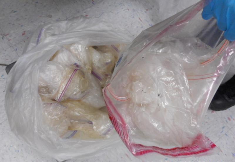 CBP officers retrieved four packages of alleged crystal methamphetamine from within the rocker panels of the vehicle. 