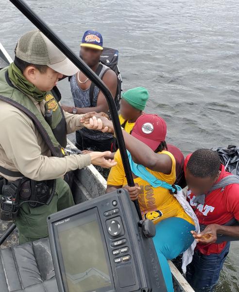 Border Patrol agents rescued six Haitian nationals, including two children under the age of 1.