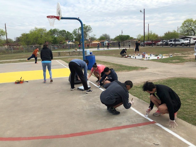 Explorers re-painted lines on the basketball courts and decorated surrounding masonry with paint and artwork.