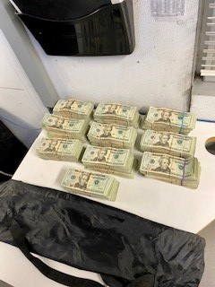 Stacks of $100,025 in unreported currency seized by CBP officers at Rio Grande City Port of Entry