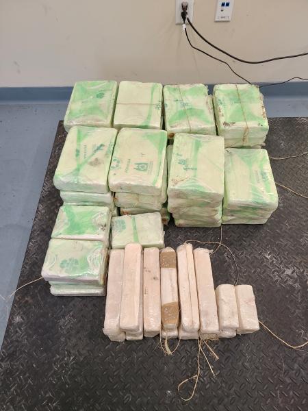 Packages containing more than 180 pounds of methamphetamine seized by U>S> Border Patrol agents at Falfurrias checkpoint
