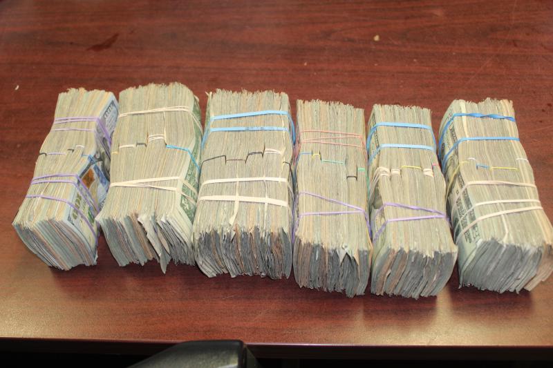Stacks containing $195,731 in unreported currency seized by CBP officers at Laredo Port of Entry