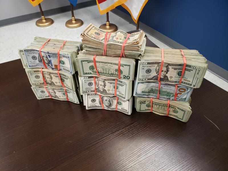 Stacks containing $201,585 in unreported currency seized by CBP officers at Roma Port of Entry