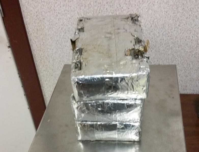Packages containing 8.62 pounds of heroin seized by CBP officers at Brownsville Port of Entry