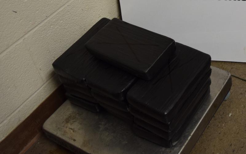 Packages containing 33 pounds of cocaine seized by CBP officers at Brownsville Port of Entry
