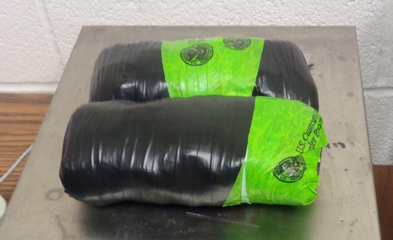 Packages containing 2.58 pounds of heroin seized by CBP officers at Brownsville Port of Entry