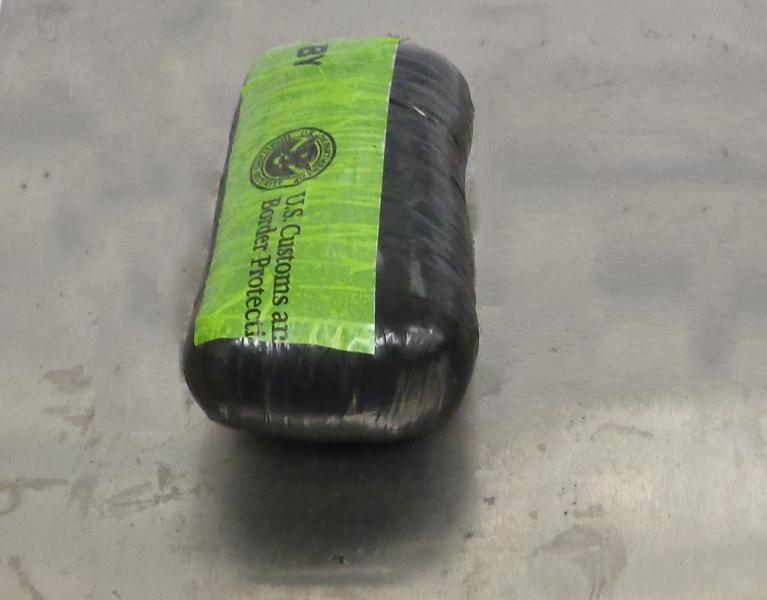 A package containing 0.8 pounds of cocaine seized from a body carrier at Brownsville Port of Entry
